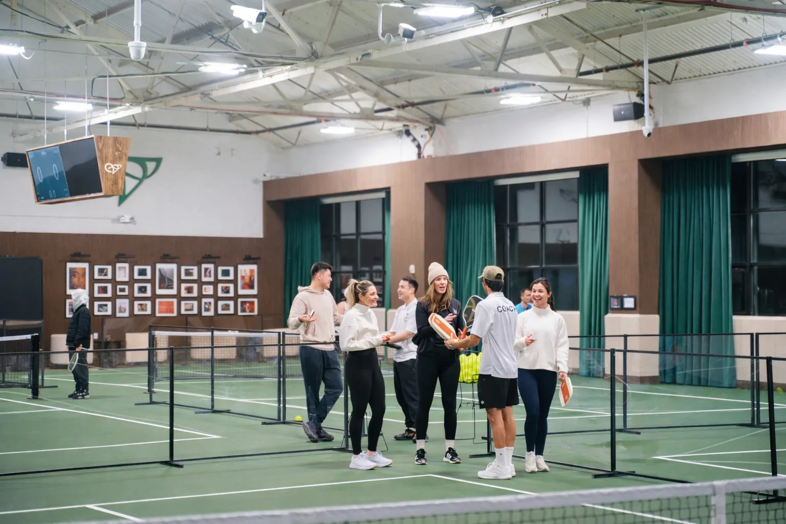 Group of players socializing on courts